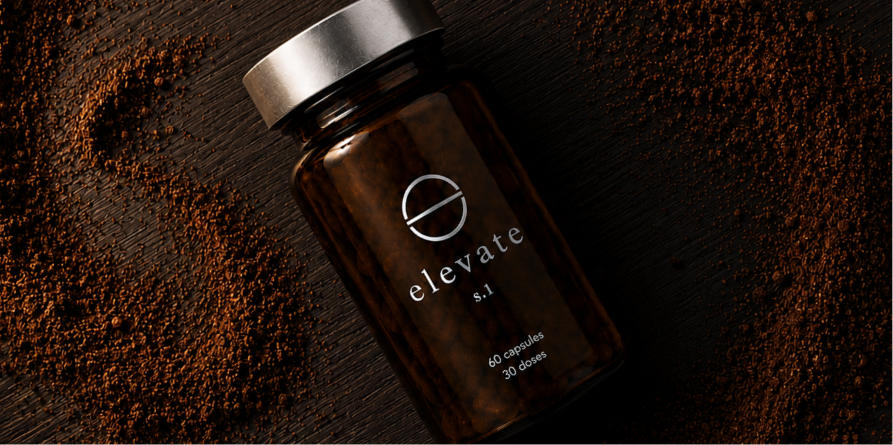 Elevate bottle resting on sand
